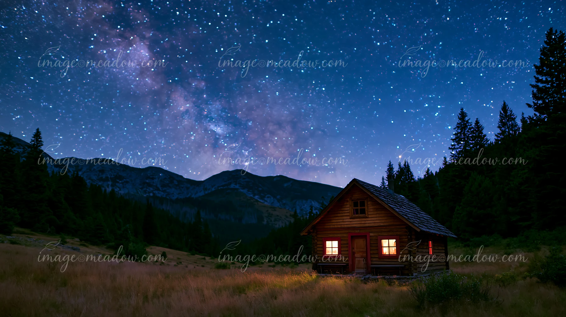 A cozy cabin stands alone in a meadow with glowing windows under a starry sky filled with the Milky Way.