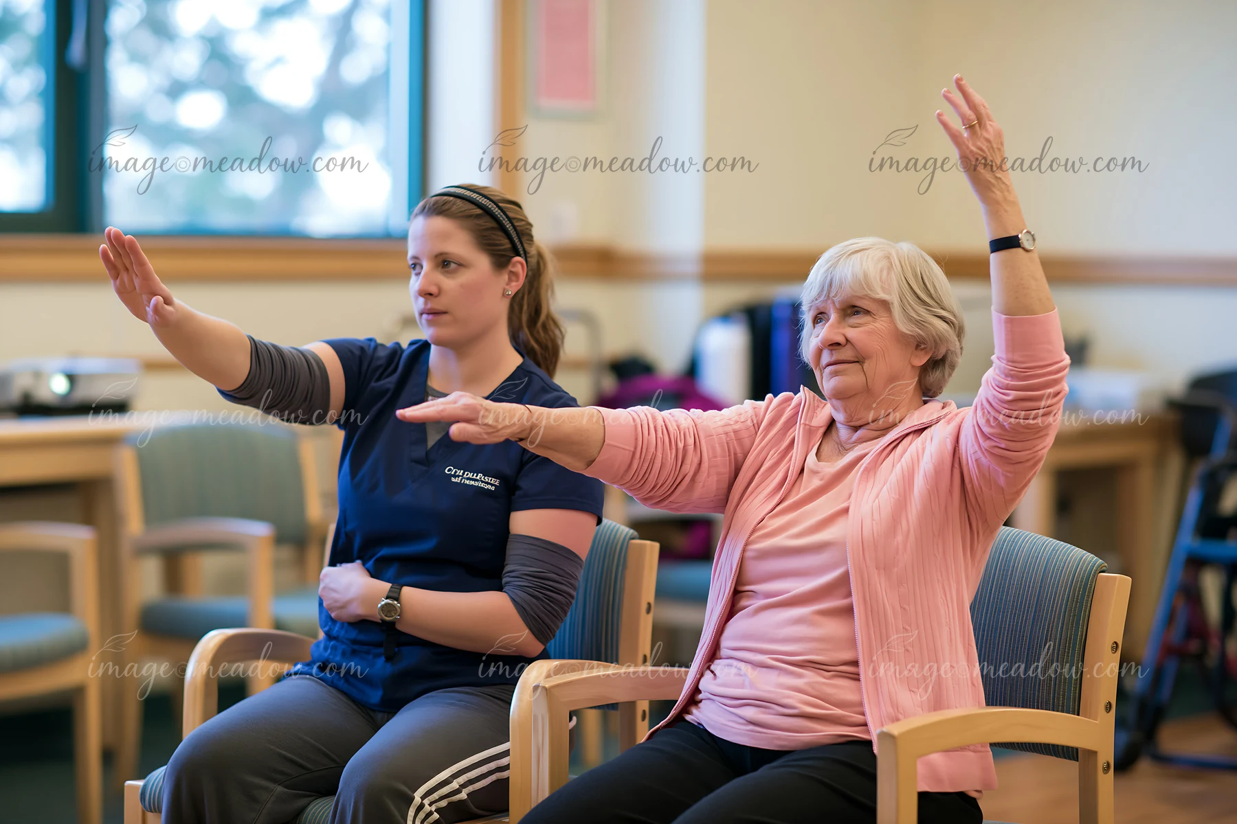 A physical therapist demonstrates exercises to a patient with Parkinson's in a clinic.