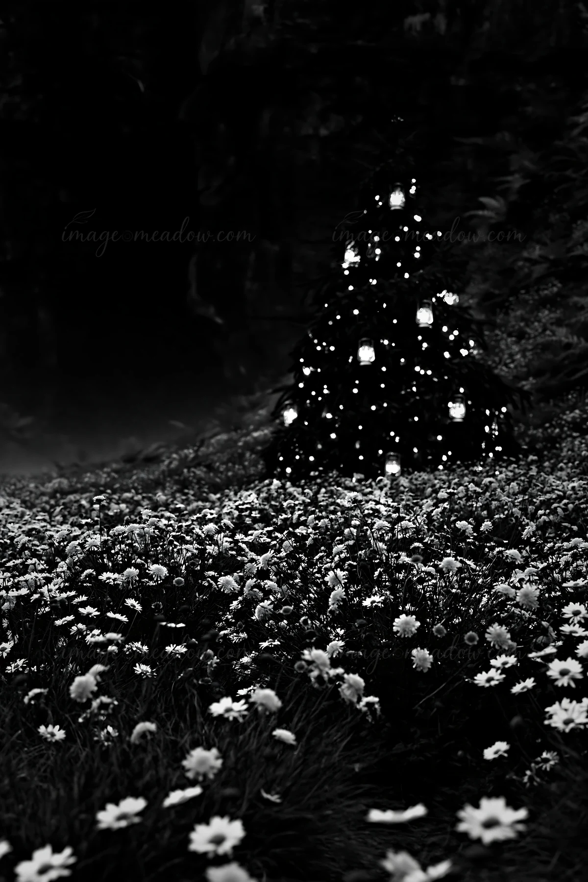 A Christmas tree with ornaments stands in a meadow filled with flowers, close to a cave. The scene captures the decorations and the natural landscape in black a