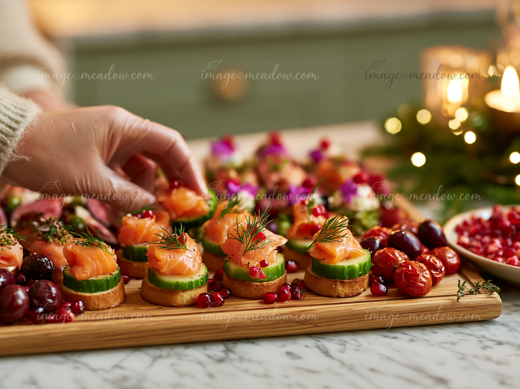 Colorful appetizers are arranged on a wooden serving board.