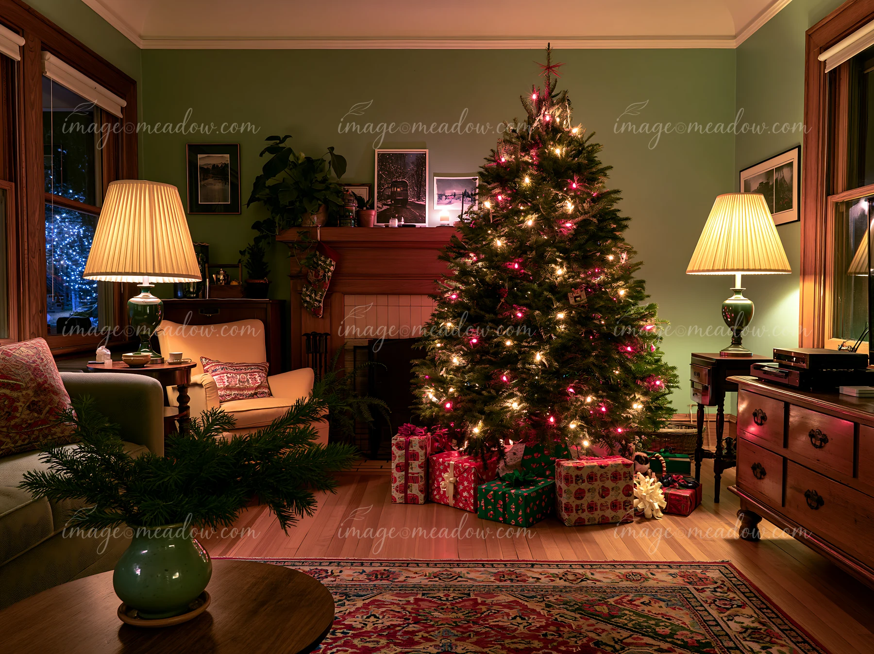 A Christmas living room features a decorated tree with lights, surrounded by wrapped gifts.