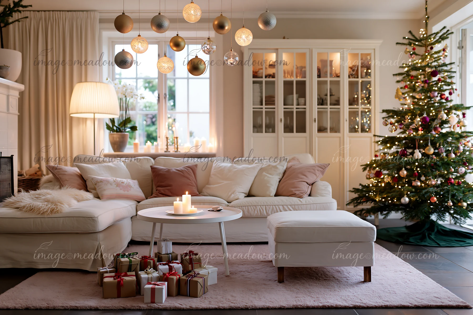 A Christmas living room features a decorated tree, wrapped gifts, and hanging ornaments.