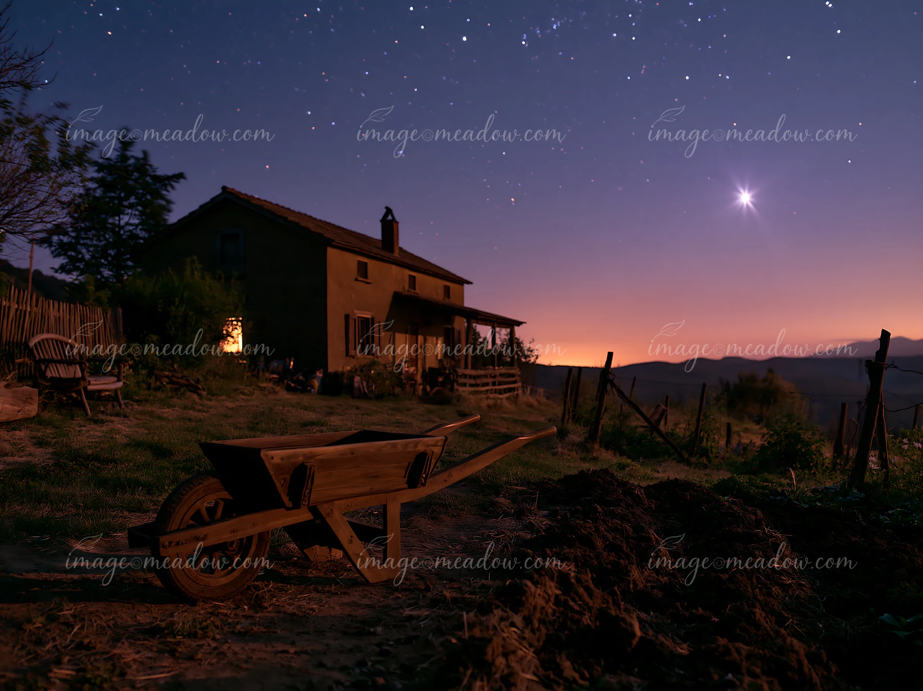 A farmhouse sits under a starry sky with rolling hills in the distance.