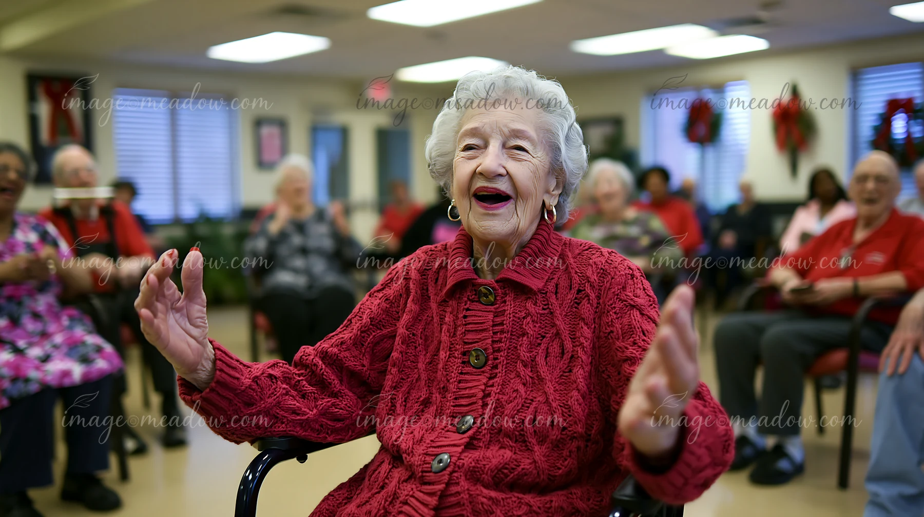 An elderly woman singing in a Parkinson's therapy group engages with others in a brightly lit room.