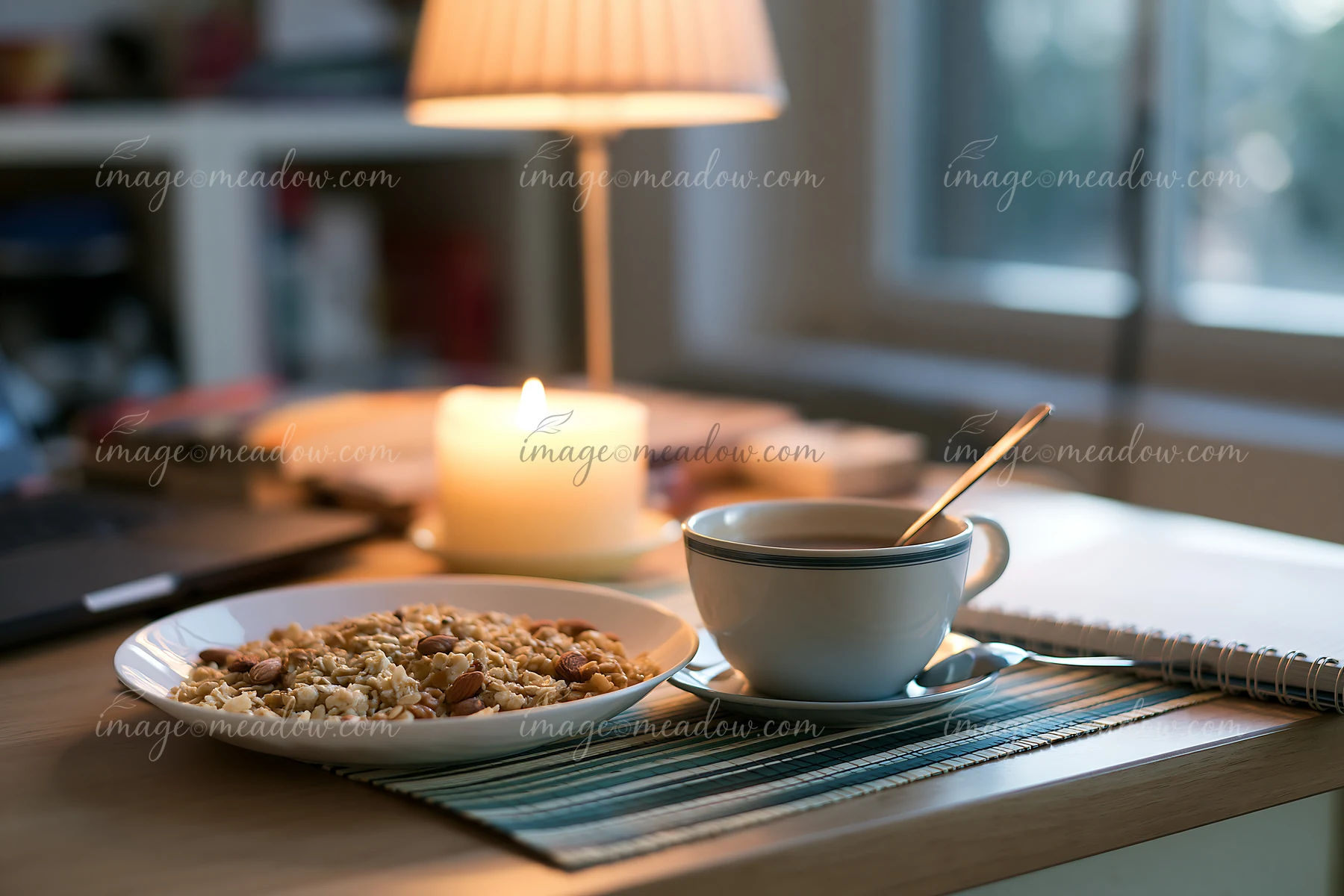 Breakfast plate with muesli sits beside a cup of coffee on a wooden table.