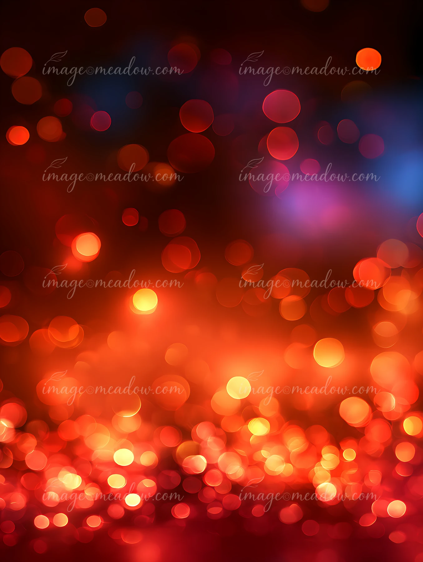 Bright circles of light blur together, creating a colorful bokeh effect in a warm color palette.