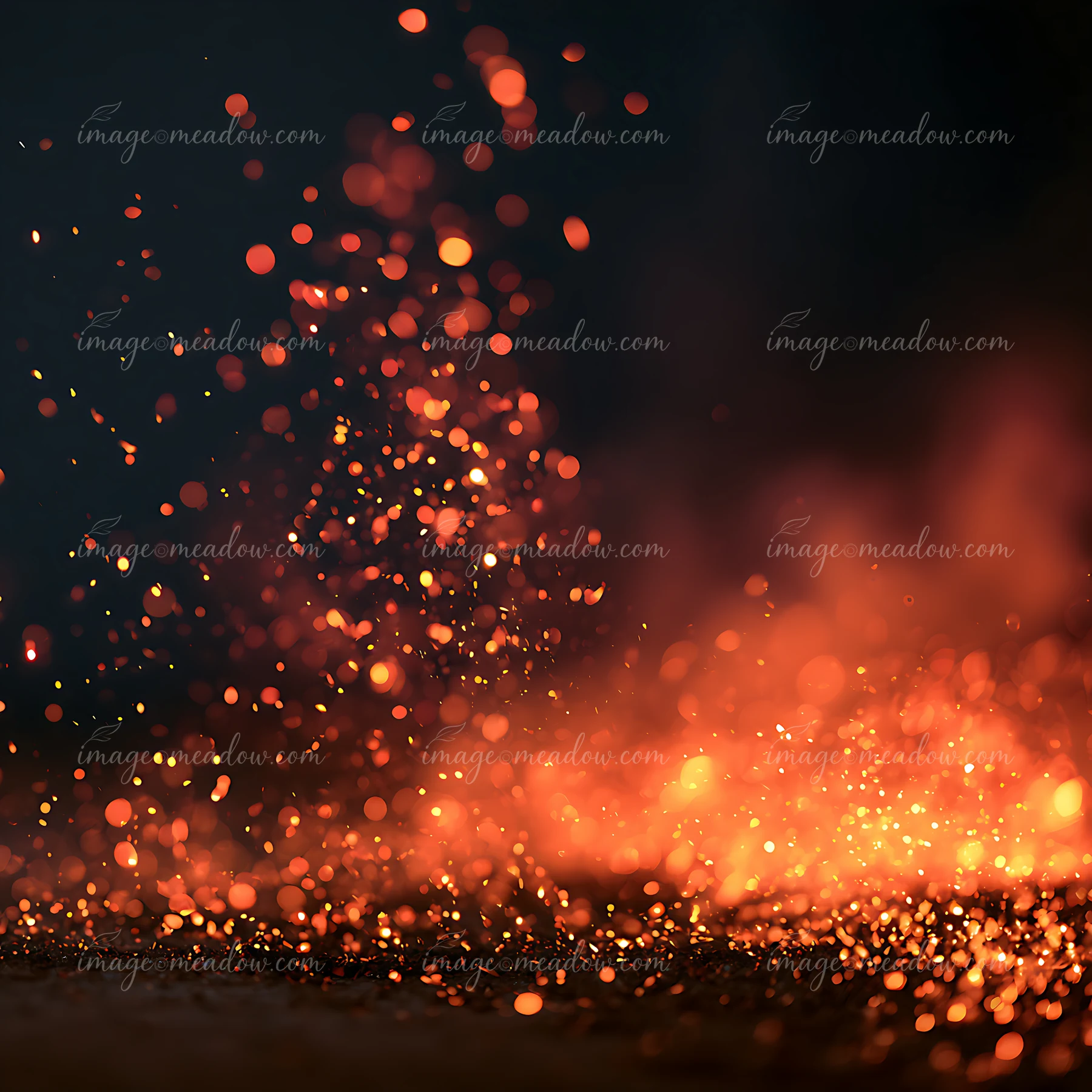 Bright sparks and glowing embers rise from a dark surface, creating a vivid scene filled with warm colors.