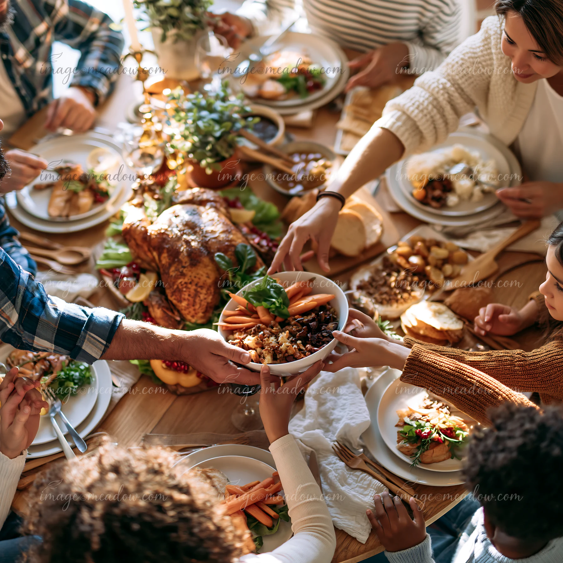 Family members share plates of roast meat and vegetables around a festive buffet dinner table at home.