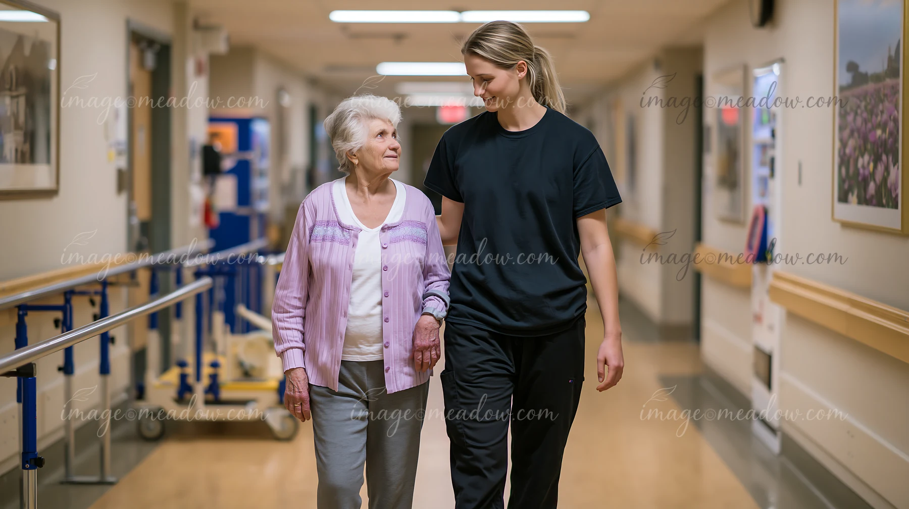 Medical professional measuring elderly patient's gait in a hospital hallway.