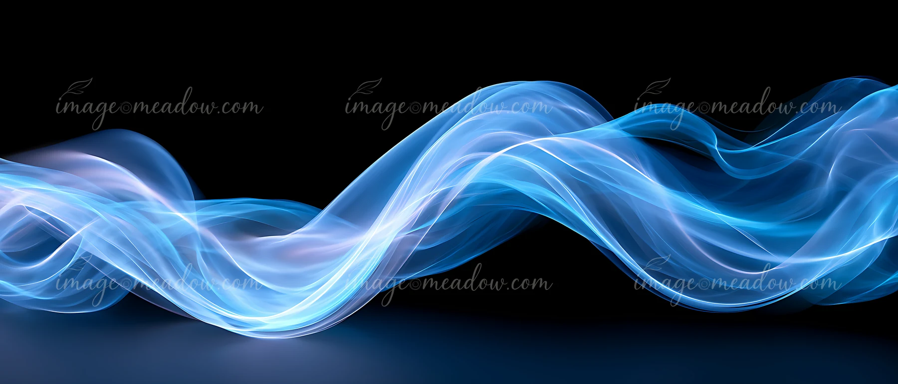 The image shows flowing blue waves created with light against a black background.