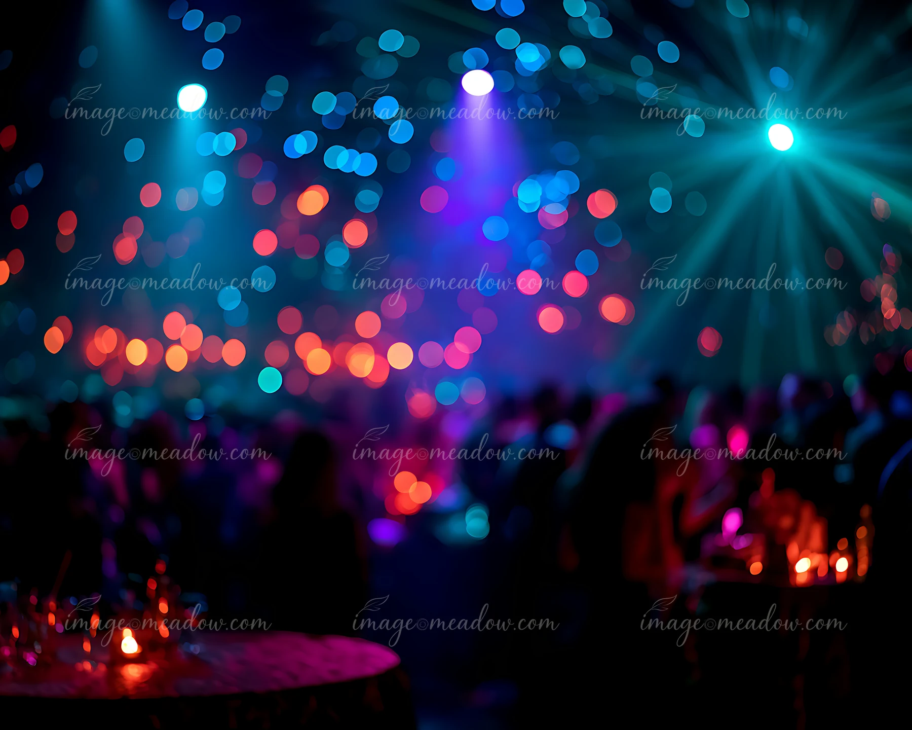 The scene shows a lively party with a crowd gathered, colorful lights shining, and small tables with candles.