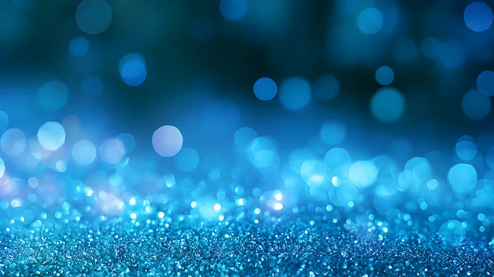 A collection of blue bokeh lights creates a vibrant background with a textured surface.