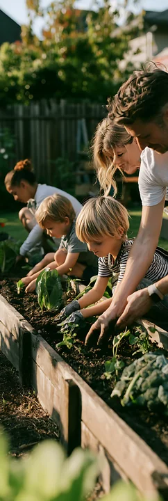 A family works together planting vegetables in a backyard garden.