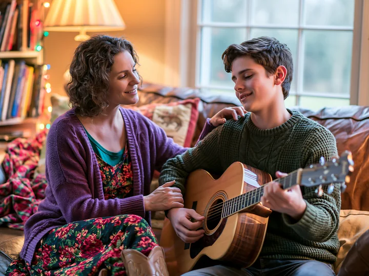 A mother and her son enjoy a cozy moment in their living room as he plays guitar.