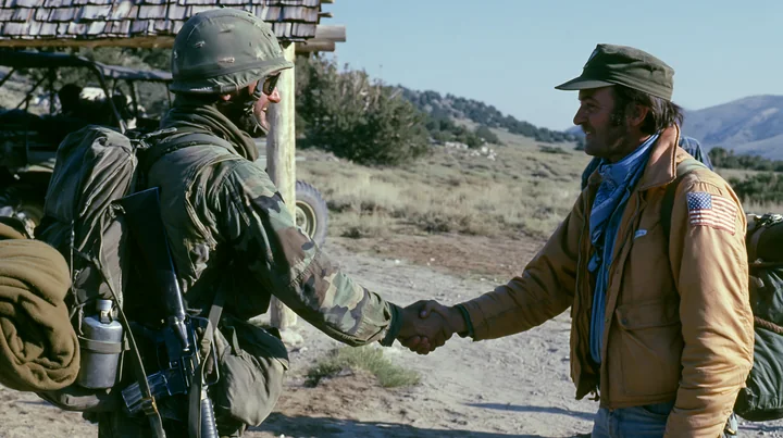 A soldier shaking hands with a civilian in a rural area.