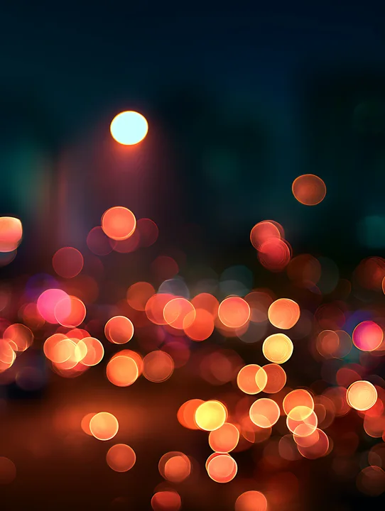 Bright, blurred lights fill the frame, creating a colorful atmosphere in a nighttime setting.