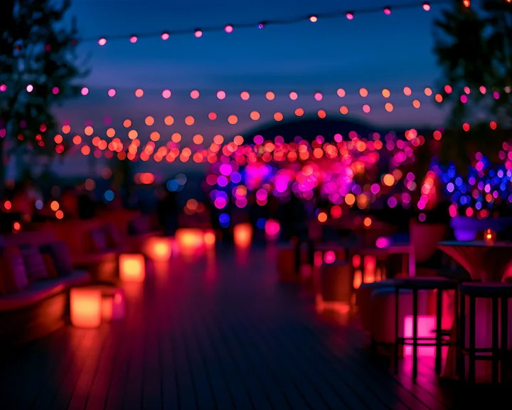 Bright string lights and glowing lanterns create a vibrant atmosphere at a nighttime gathering.