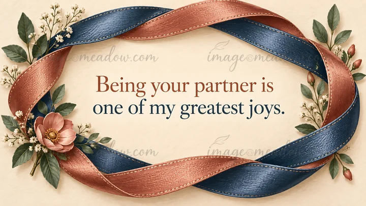 A romantic greeting card reads “Being your partner is one of my greatest joys.” Interwoven navy and terracotta stitched ribbons frame the message, with pink and