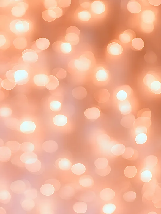 The image shows a background filled with soft bokeh lights glowing warmly, creating an inviting atmosphere suitable for celebrations or events.