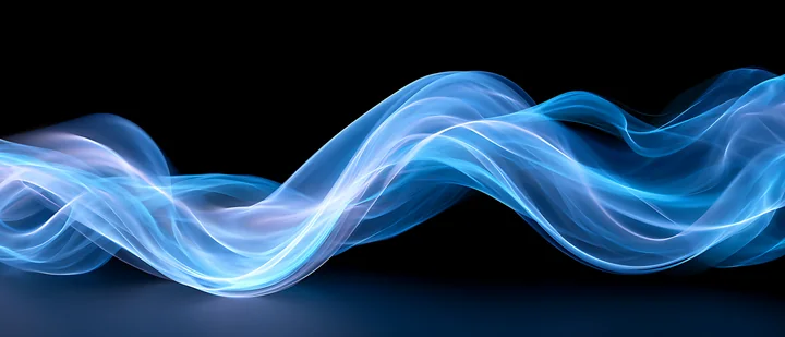 The image shows flowing blue waves created with light against a black background.